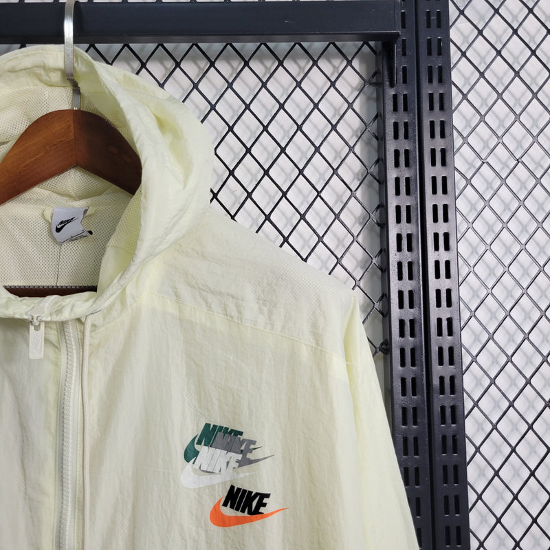 Jaqueta Corta Vento Nike Bege e Azul - 23/24