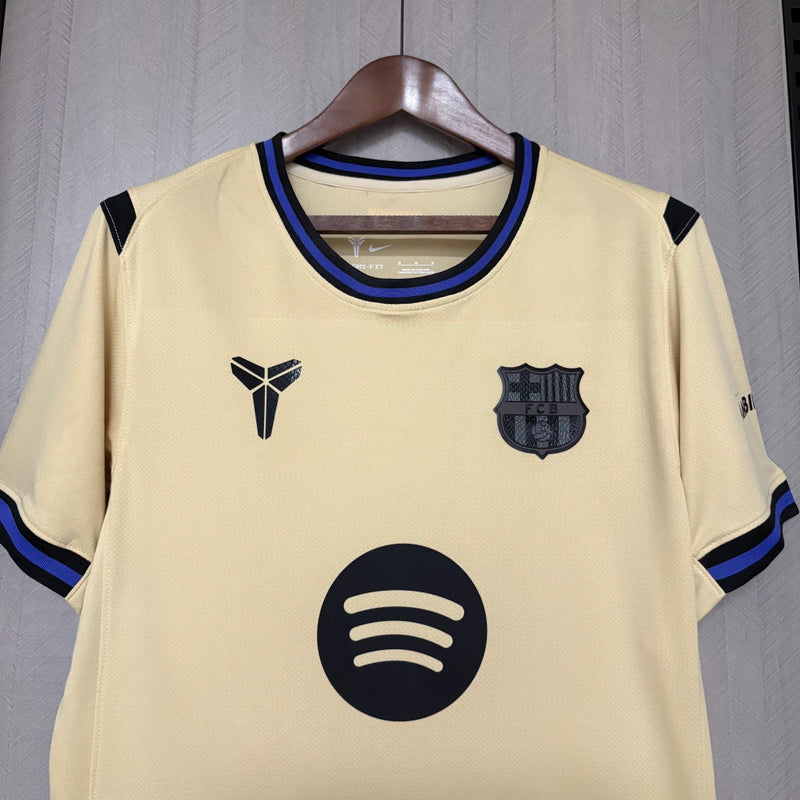 Camisa Barcelona 25/26 Away MAMBA - Masculina - Modelo Torcedor - Amarelo Dourado